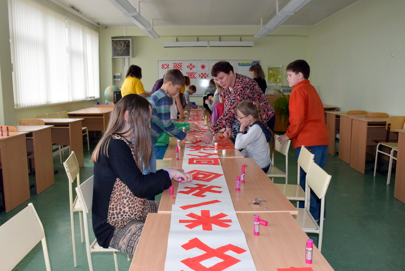 “Raksti un zīmes”